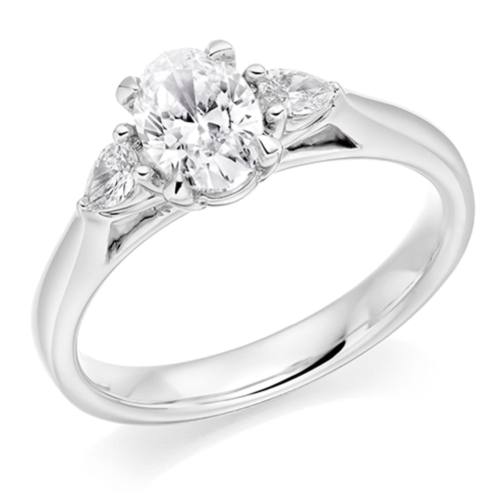 Platinum 0.71ct Oval Diamond Trilogy Ring
